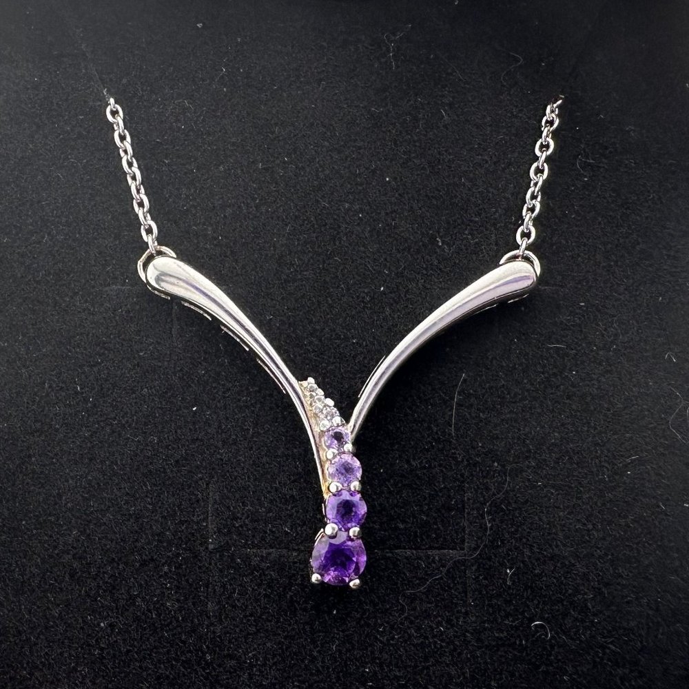 Beautiful African Amethysts graduating in size and color from pink to purples -